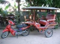 Een tweepersoons tuktuk