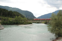 Bernina Express op spoorbrug Reichenau met Vorder- en Hinterrhein / Bron: ©ottergraafjes